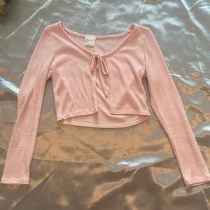 Light pink cropped open front cardigan